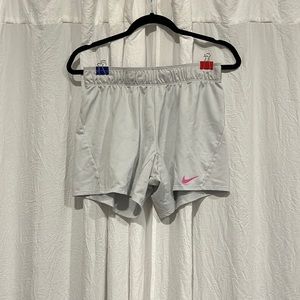 Off white Nike running shorts